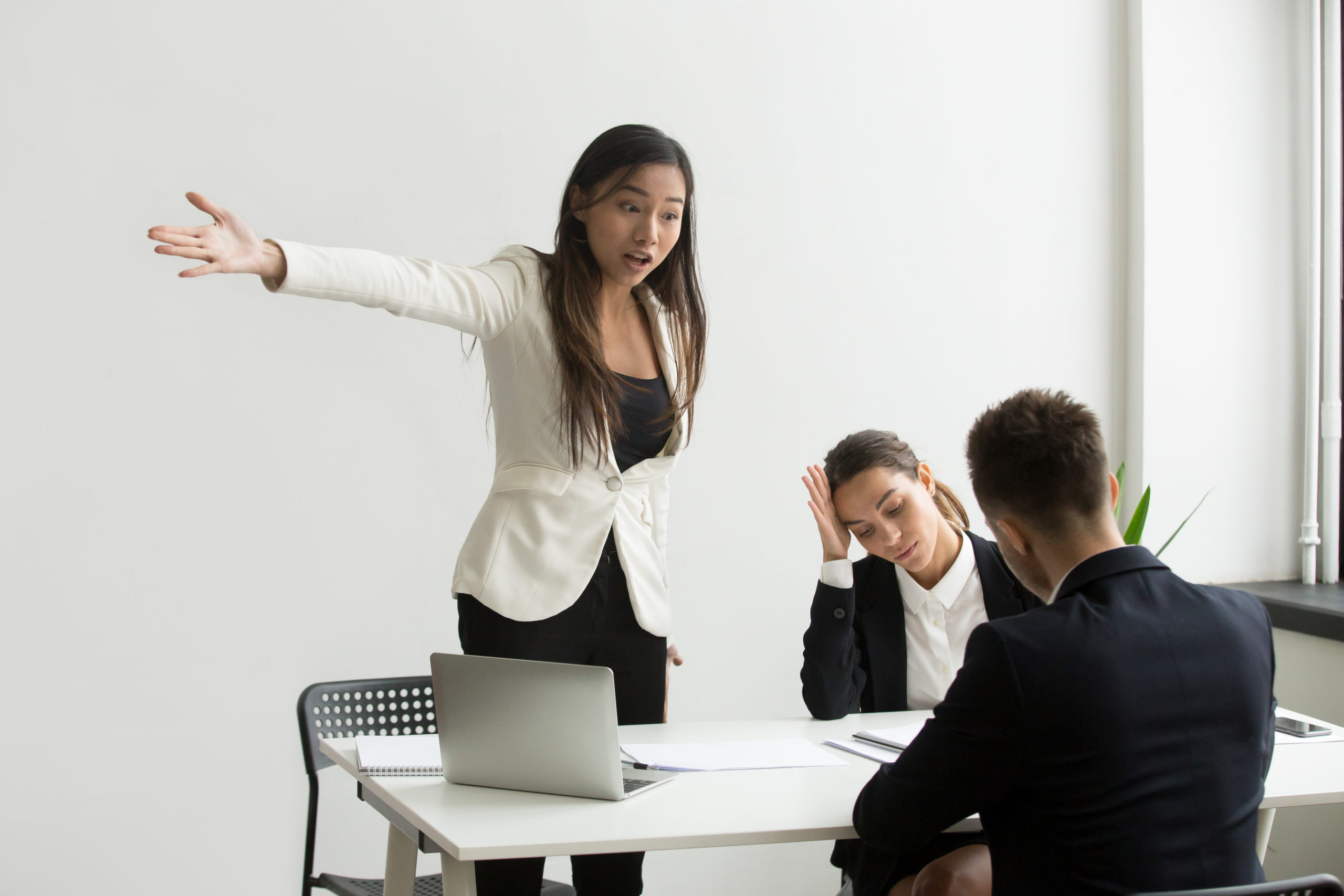 Angry mad HR manager pointing at door, making verbal sign for job applicant to leave. Work candidate showing no respect for employers. Concept of bad interview, disagreement, nervous workers